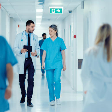doctor and nurse in hospital corridor